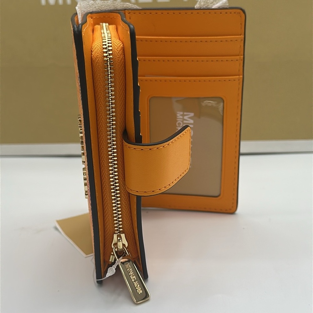 Michael Kors Jet Set Travel Medium Printed Signature Logo Bi-Fold
Pop Orange - Picture 10 of 14